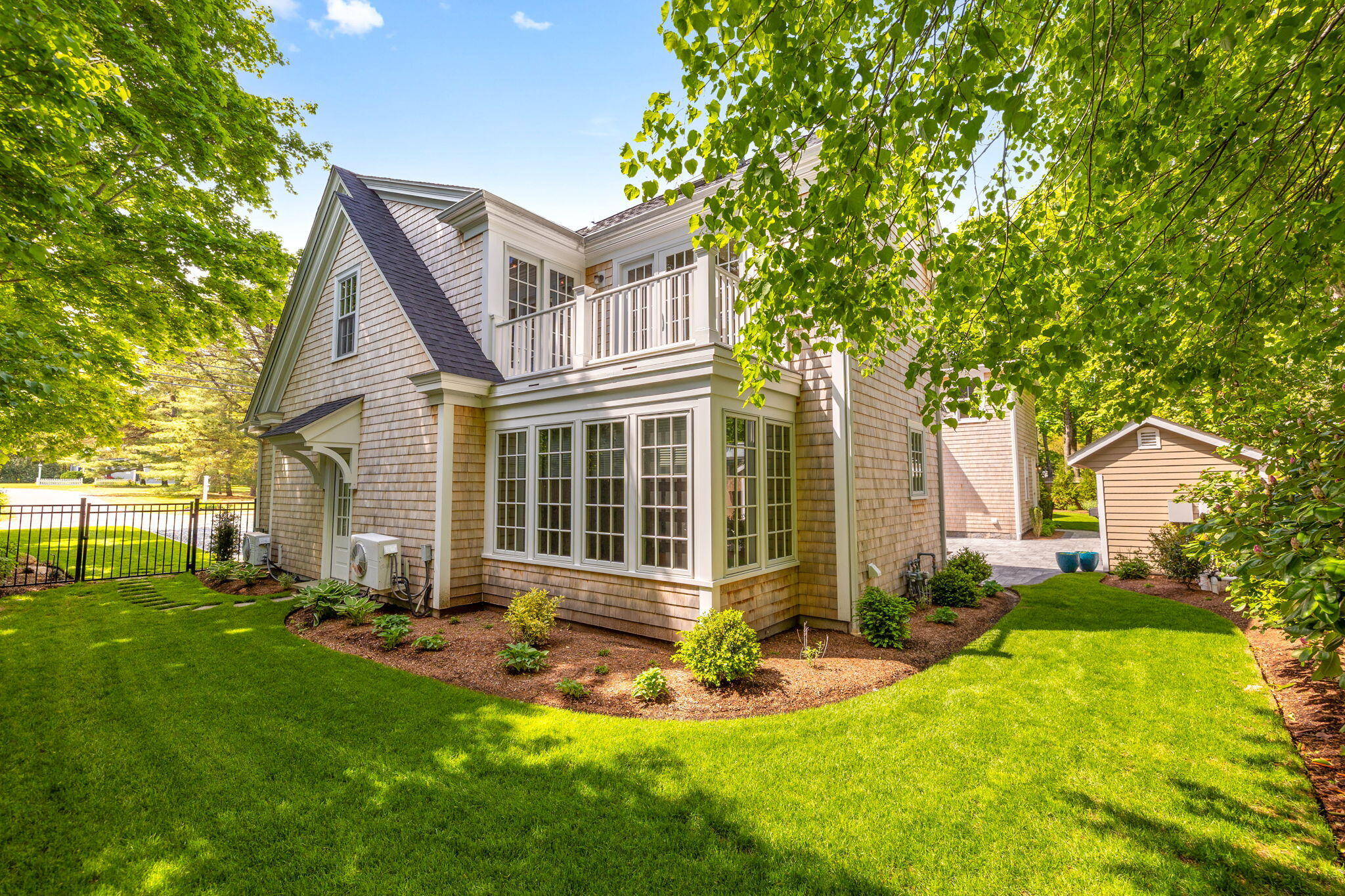 1180 Main Street Cotuit, MA 02635 - Photo 52 of 82 front view of house with a yard