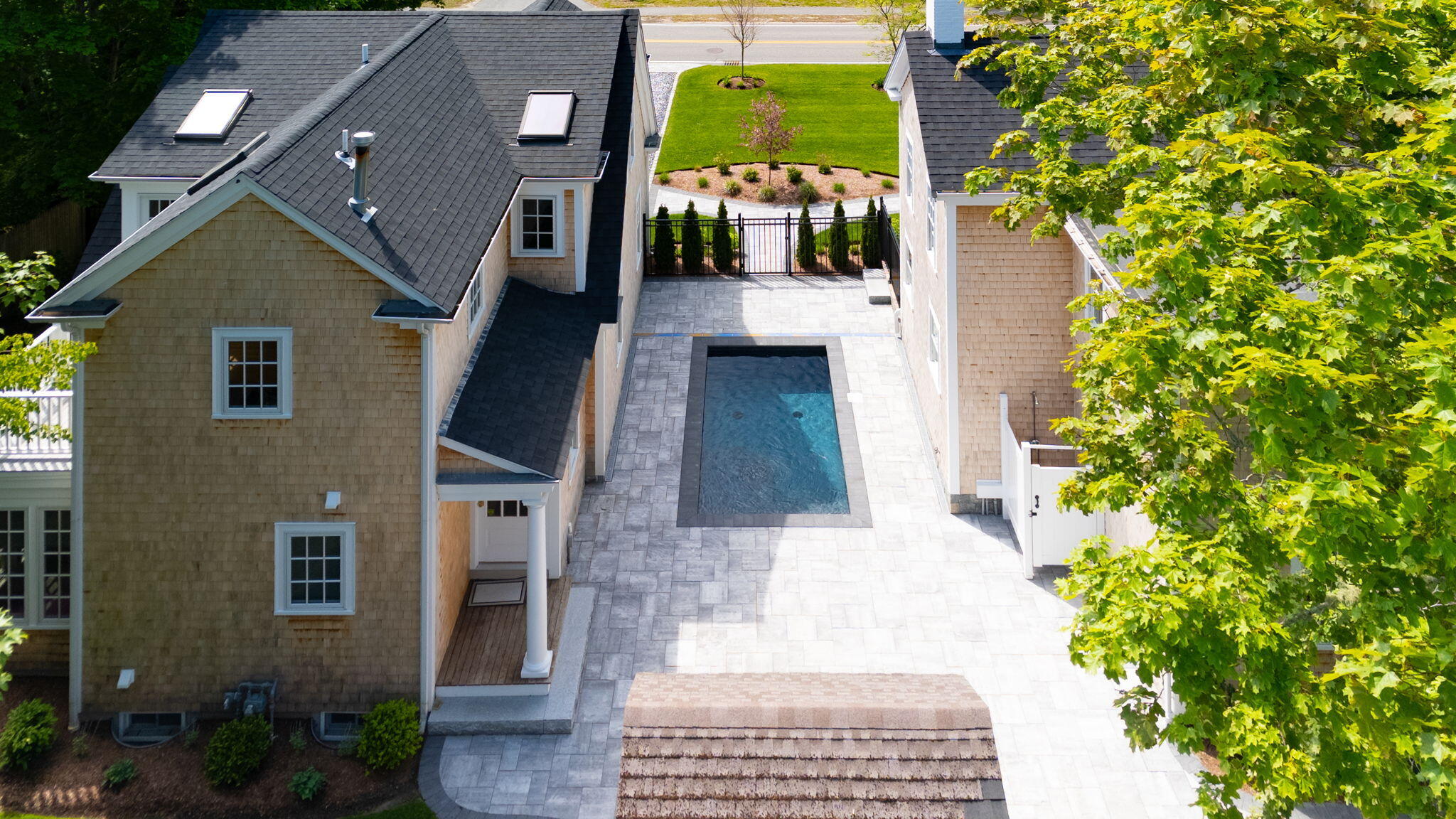 1180 Main Street Cotuit, MA 02635 - Photo 55 of 82 a front view of a house with a yard