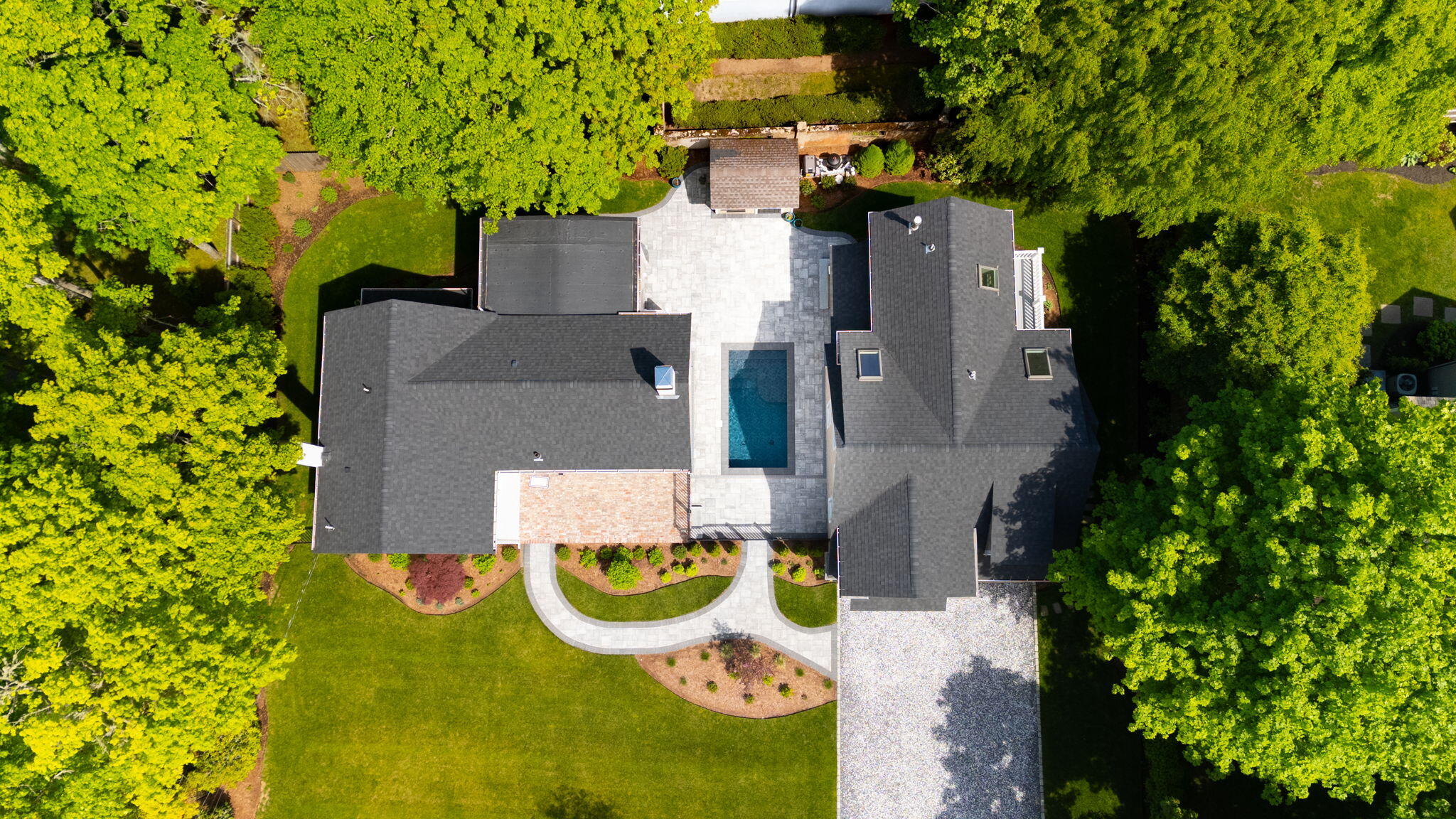 1180 Main Street Cotuit, MA 02635 - Photo 59 of 82 an aerial view of a house with swimming pool and garden
