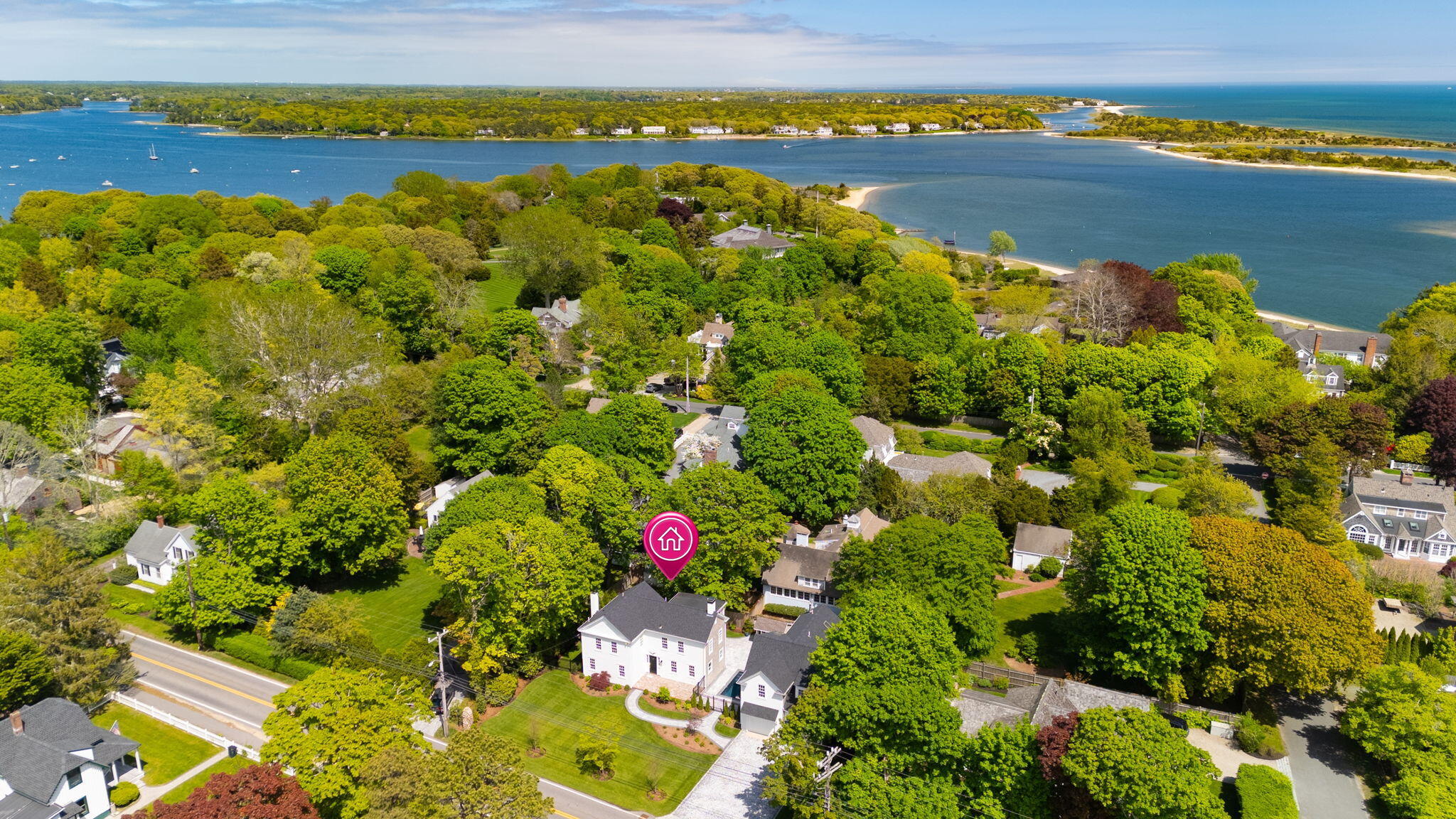 1180 Main Street Cotuit, MA 02635 - Photo 67 of 82 a view of a lake with a houses