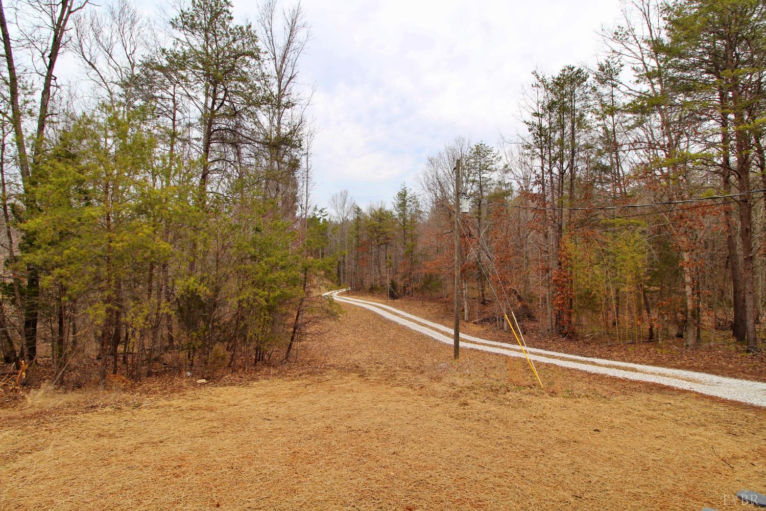 1740 Watt Abbitt Road Appomattox, VA 24522 - Photo 26 of 29 a view of a room with trees and wooden fence