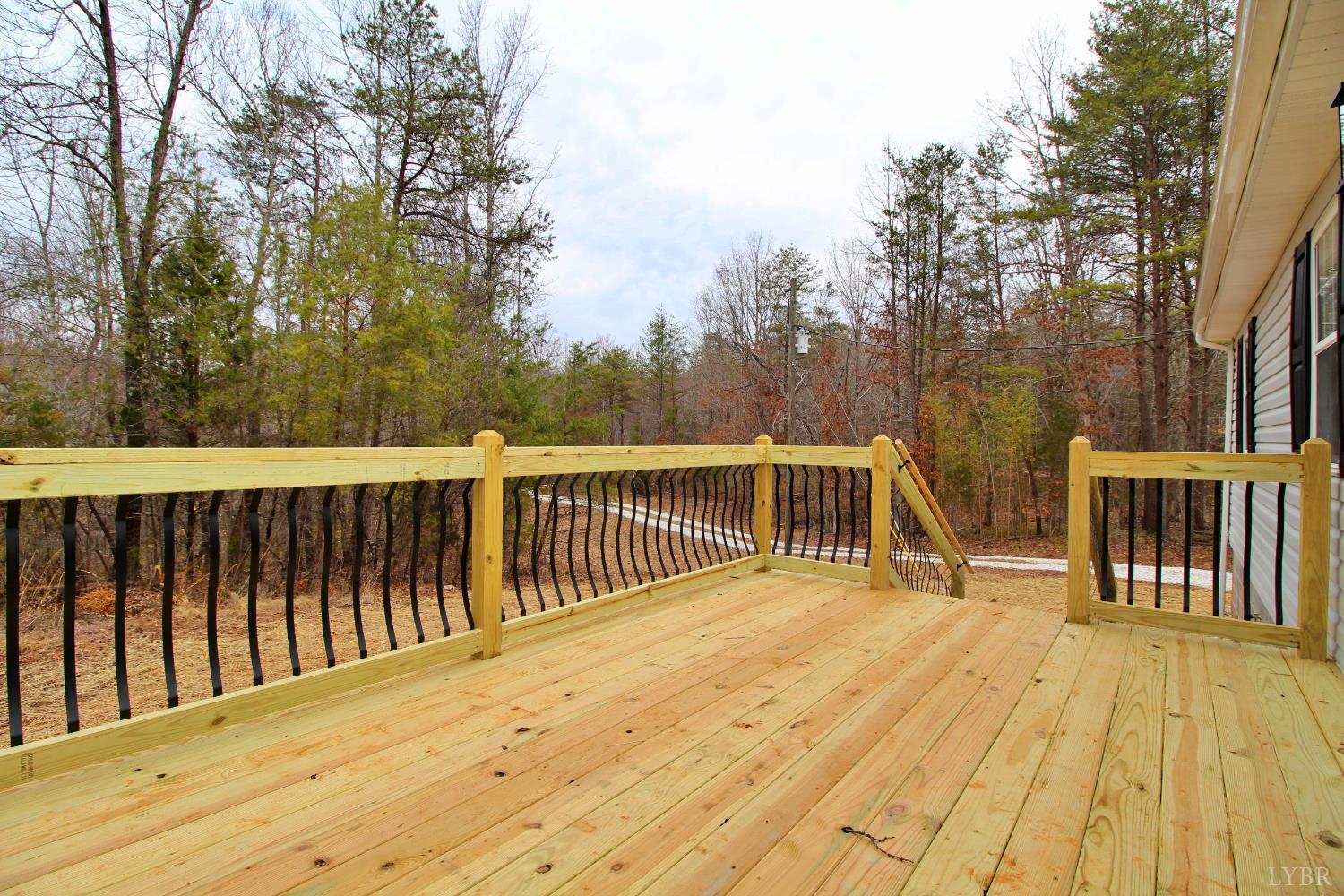 1740 Watt Abbitt Road Appomattox, VA 24522 - Photo 10 of 29 a view of balcony with wooden floor and fence