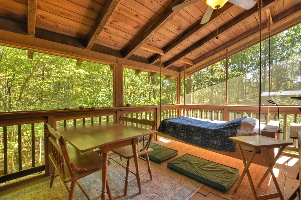 50 Skeenah Trail Blue Ridge, GA 30513 - Photo 19 of 26 a view of a chairs and table in the balcony