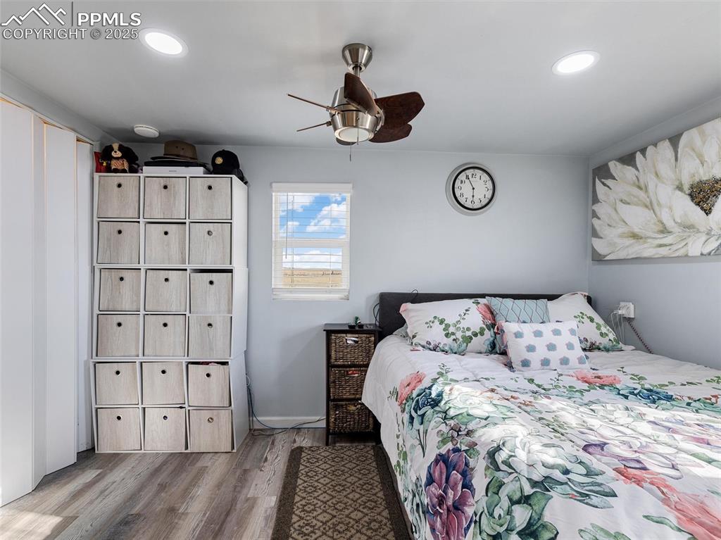 32092 Torrence Road Yoder, CO 80864 - Photo 14 of 44 a bedroom with a bed and a window