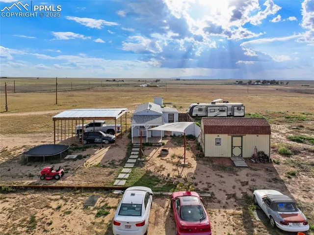 a view of a lake with a car parked