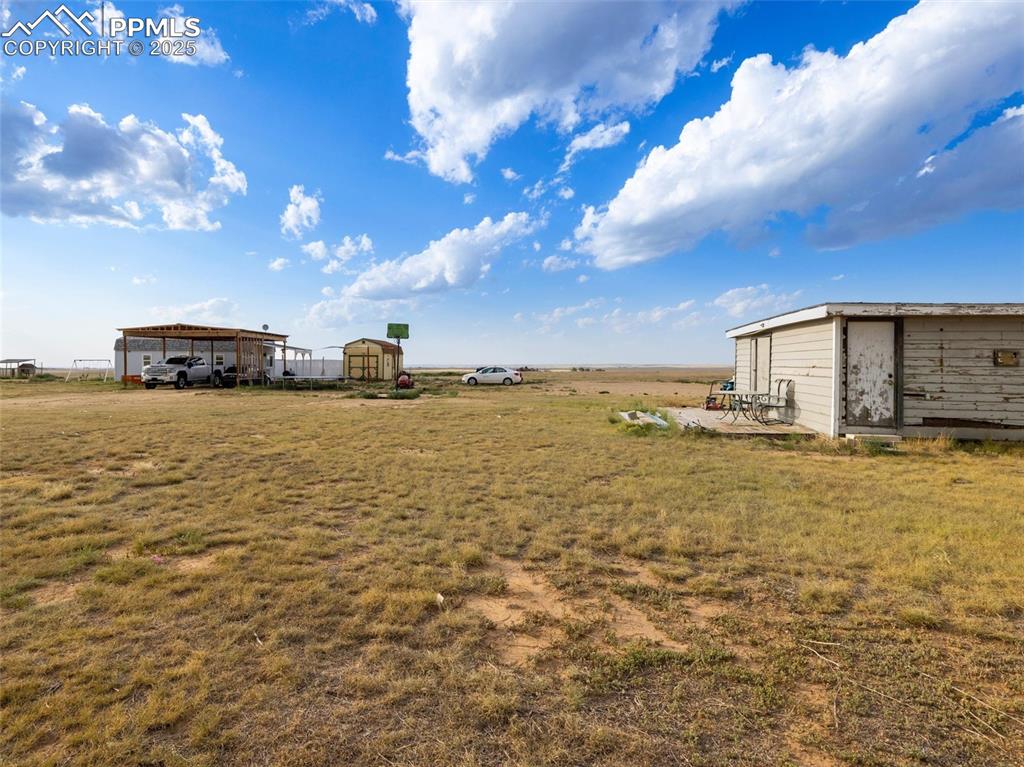 32092 Torrence Road Yoder, CO 80864 - Photo 35 of 44 a view of a ocean with beach