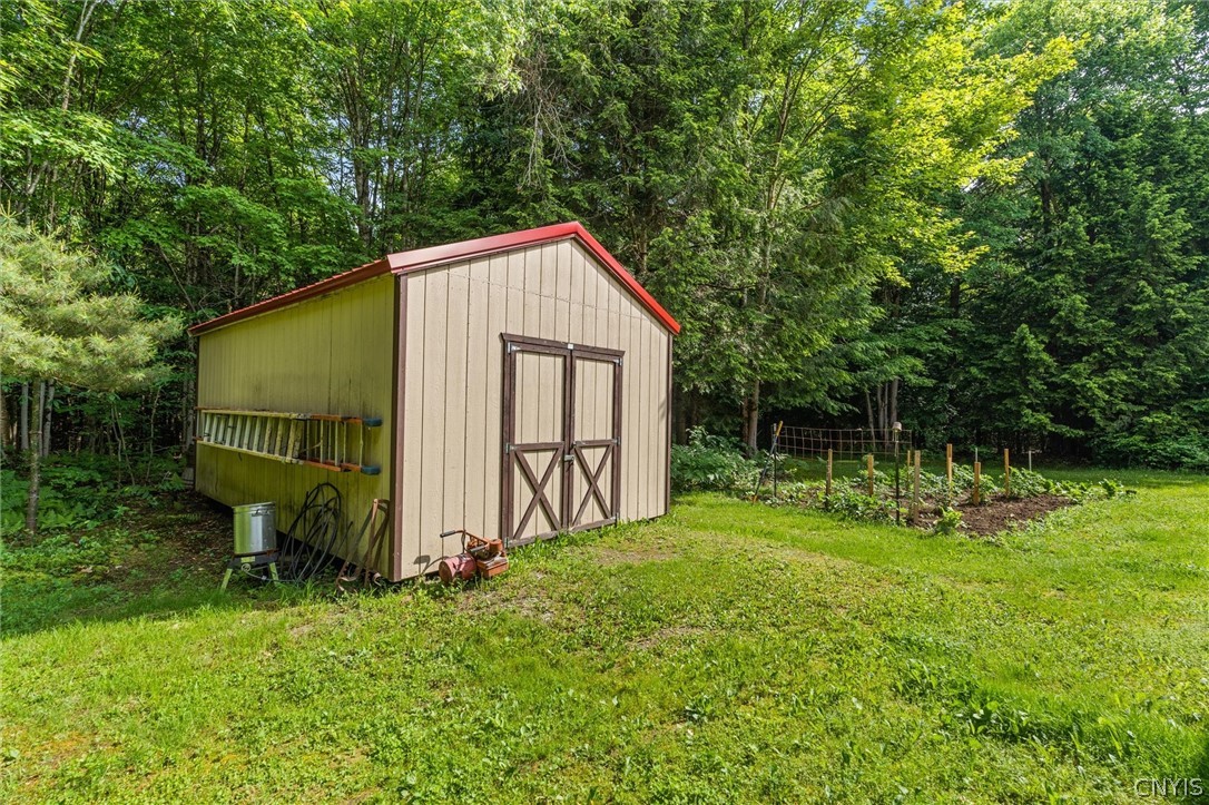 9831 Steam Mill Road Camden, NY 13316 - Photo 34 of 42 Versatile storage shed adds convenience and functi