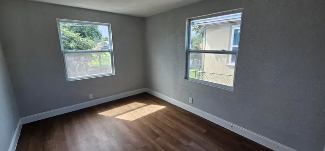 a view of an empty room and window