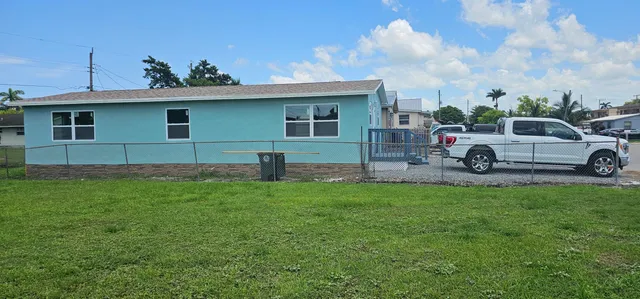 a house view with a garden space