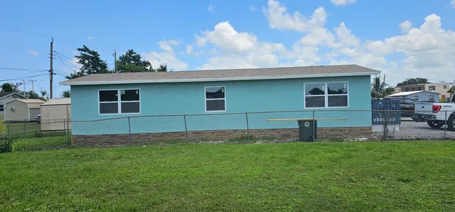 a house view with a garden space