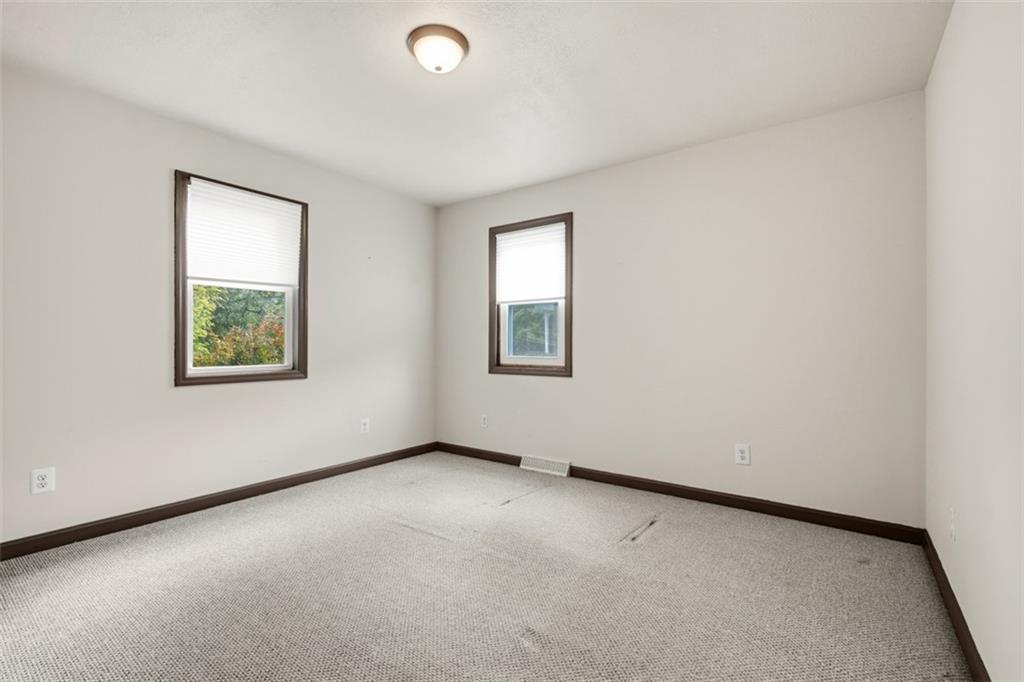 8517 Wittmer Road Pittsburgh, PA 15237 - Photo 30 of 46 an empty room with windows