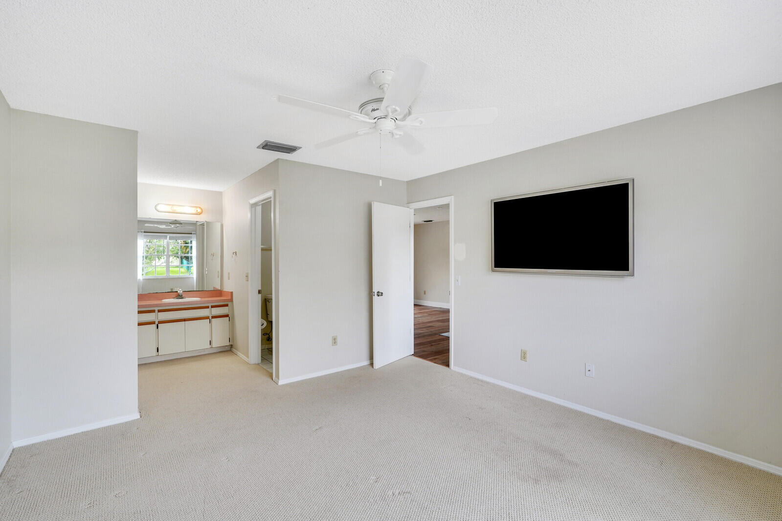 2334 Southeast Merrill Road Port St. Lucie, FL 34952 - Photo 14 of 27 a view of empty room with a flat screen tv