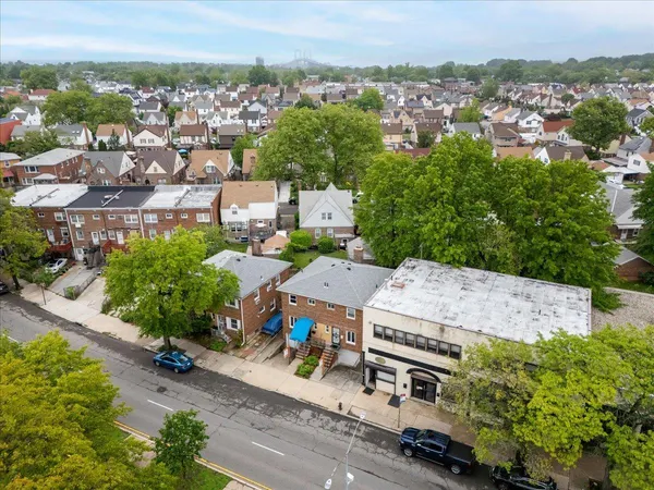 an aerial view of a house with a garden