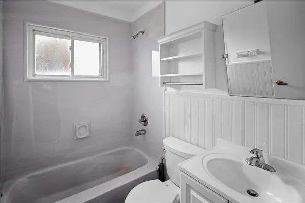 a bathroom with a sink and a bathtub