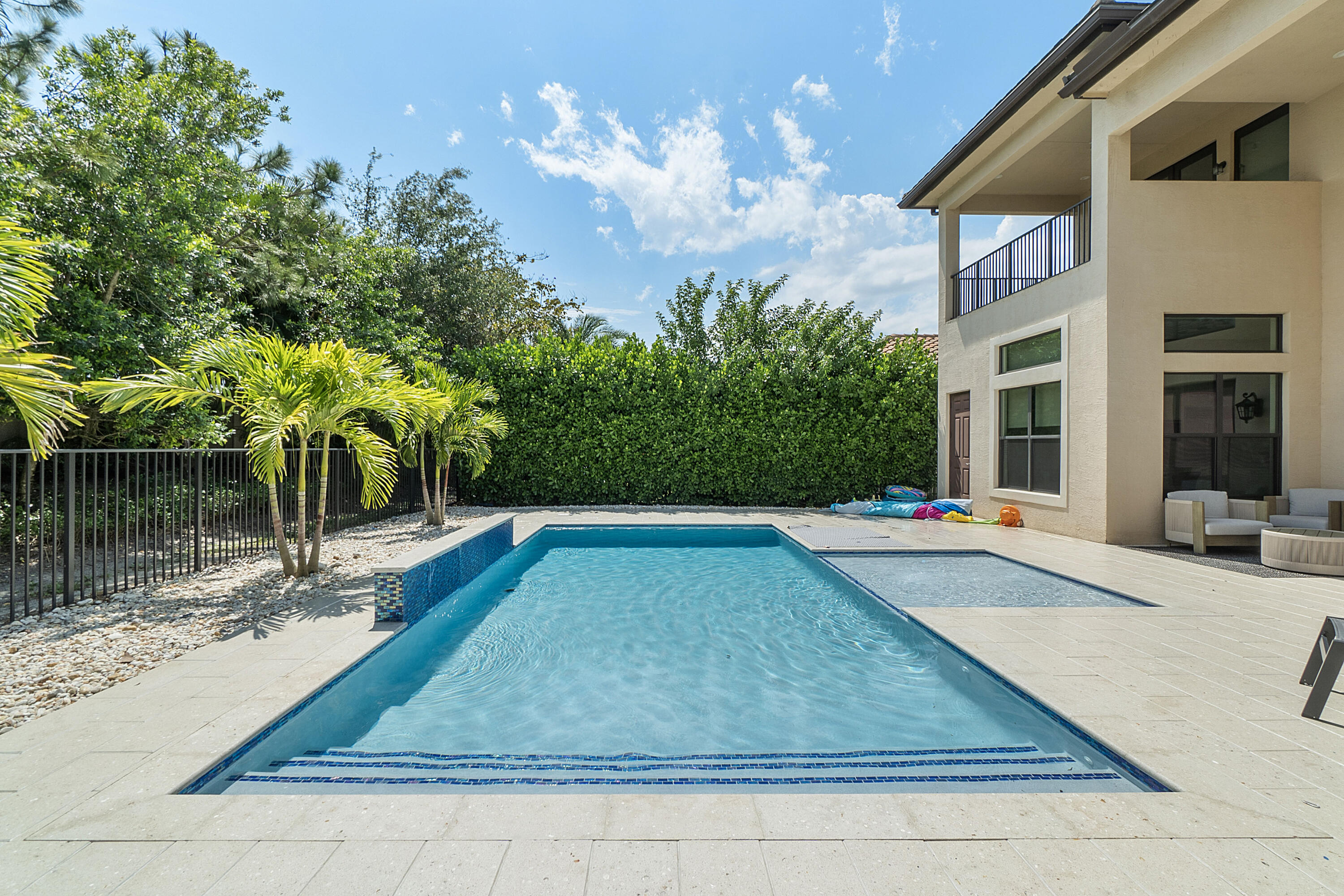 16897 Pierre Circle Delray Beach, FL 33446 - Photo 26 of 37 a view of backyard with swimming pool and outdoor seating