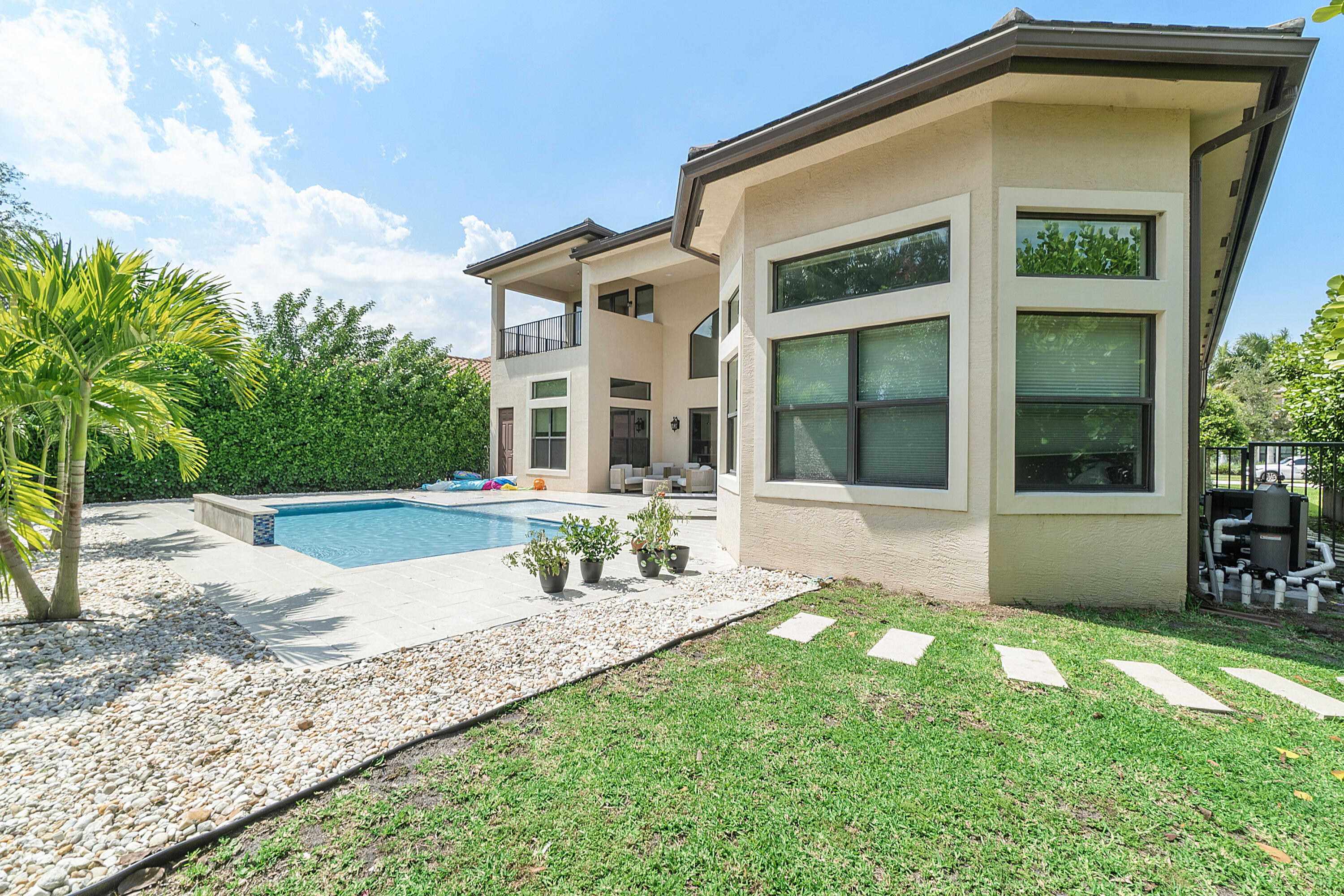 16897 Pierre Circle Delray Beach, FL 33446 - Photo 3 of 37 a view of a house with backyard and porch
