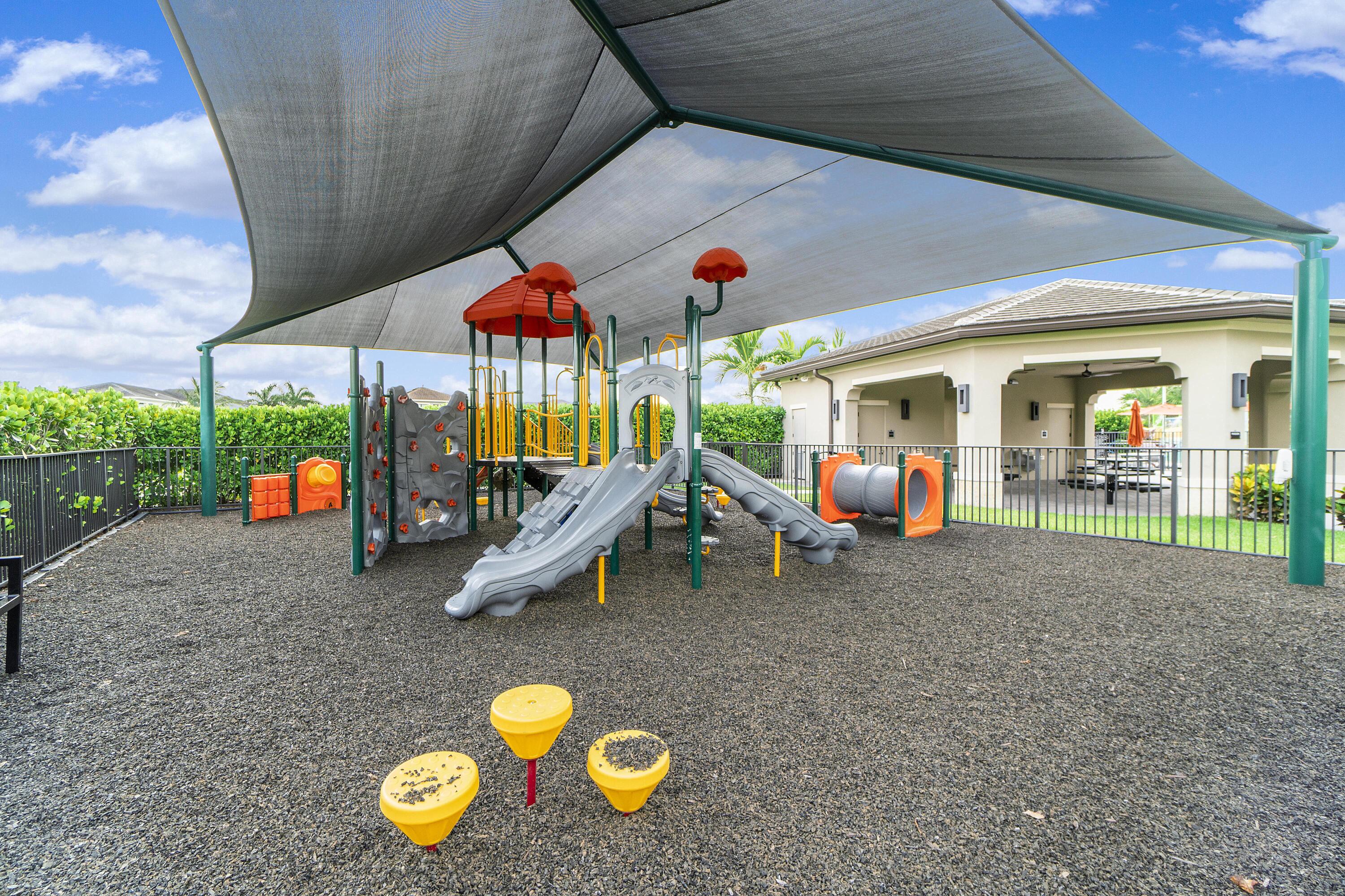 16897 Pierre Circle Delray Beach, FL 33446 - Photo 32 of 37 a view of a swimming pool with a patio