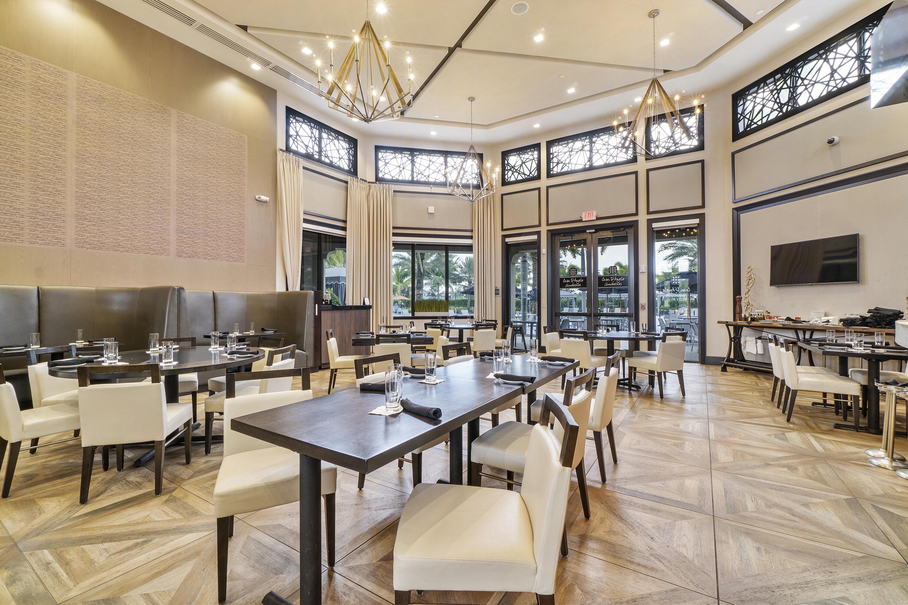 16897 Pierre Circle Delray Beach, FL 33446 - Photo 36 of 37 a view of a dining room with furniture window and outside view