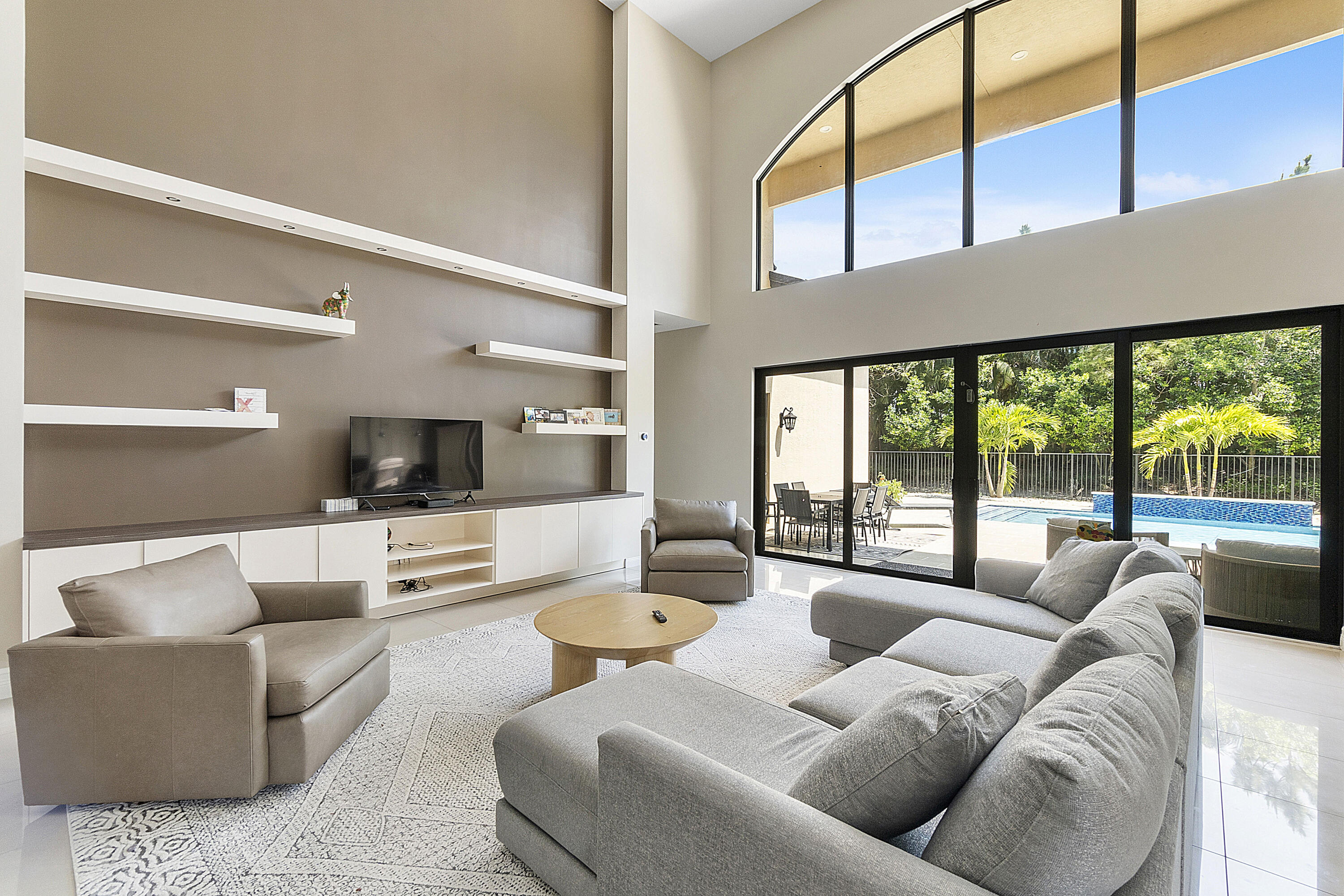 16897 Pierre Circle Delray Beach, FL 33446 - Photo 7 of 37 a living room with furniture and a large window