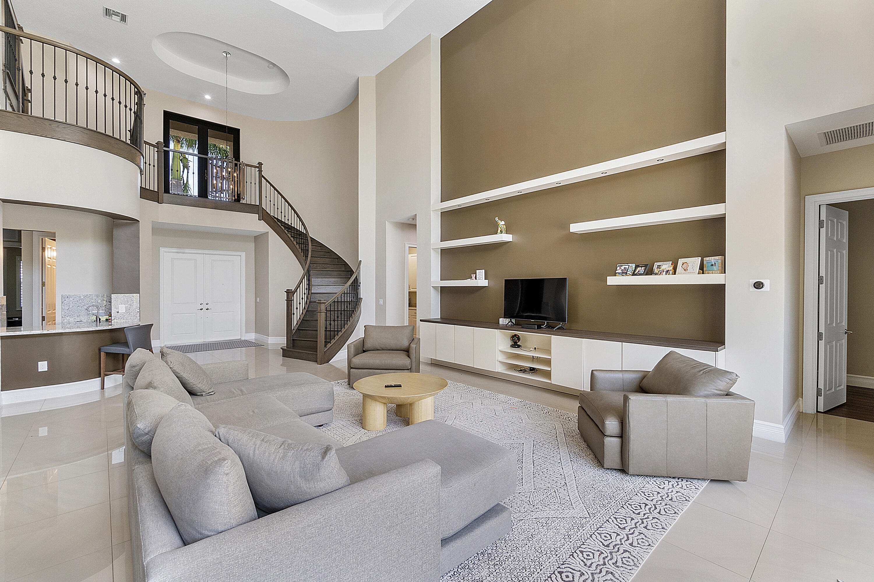 16897 Pierre Circle Delray Beach, FL 33446 - Photo 8 of 37 a living room with furniture and a flat screen tv