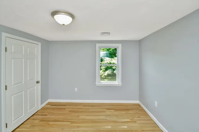 an empty room with window