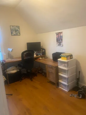 a room with furniture and a lamp