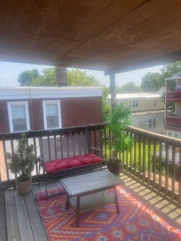 a bench sitting in front of a building