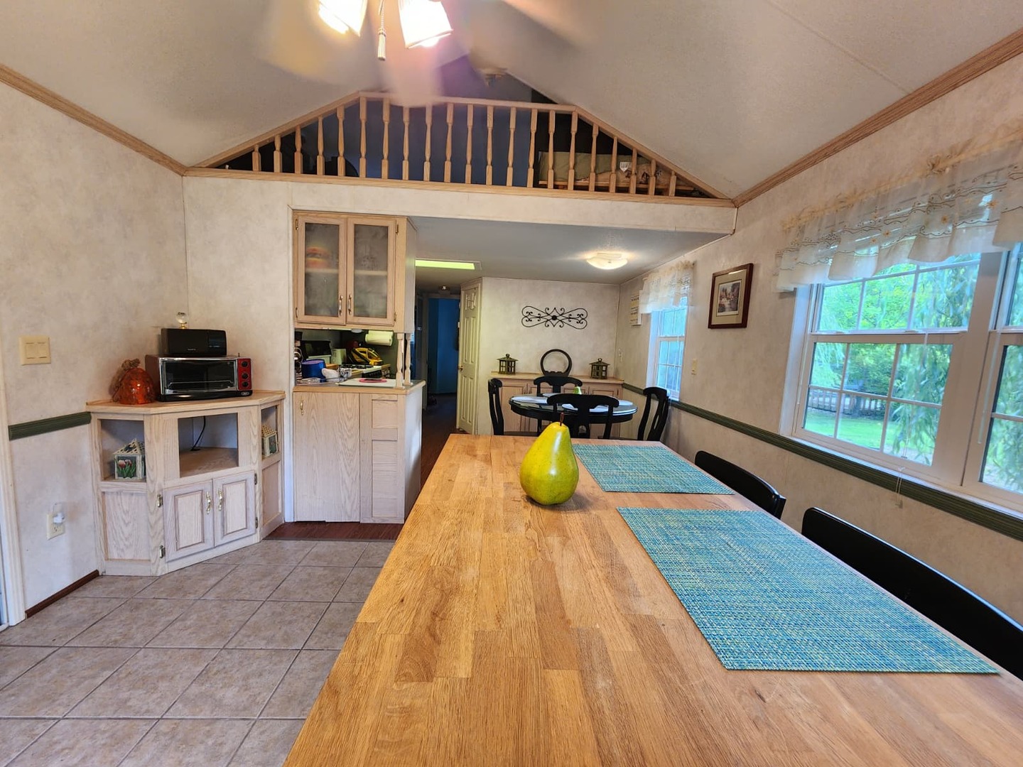 28-21 Woodhaven Sublette, IL 61367 - Photo 11 of 35 a view of kitchen with table and windows