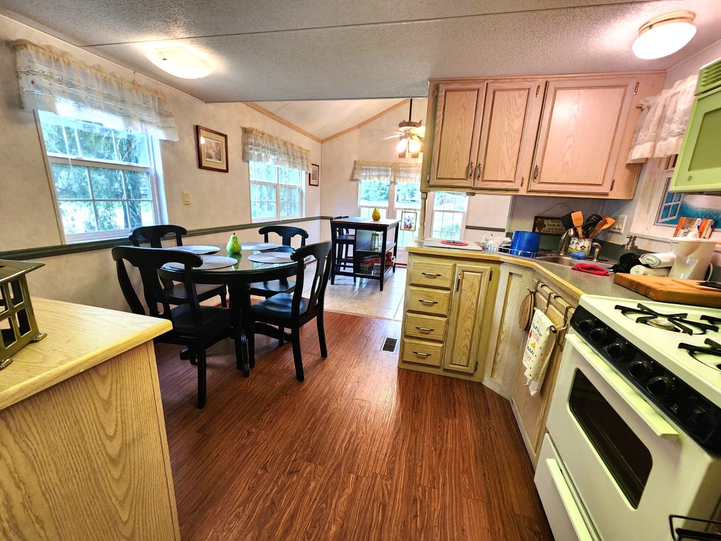 28-21 Woodhaven Sublette, IL 61367 - Photo 12 of 35 a view of a dining room with furniture window and wooden floor