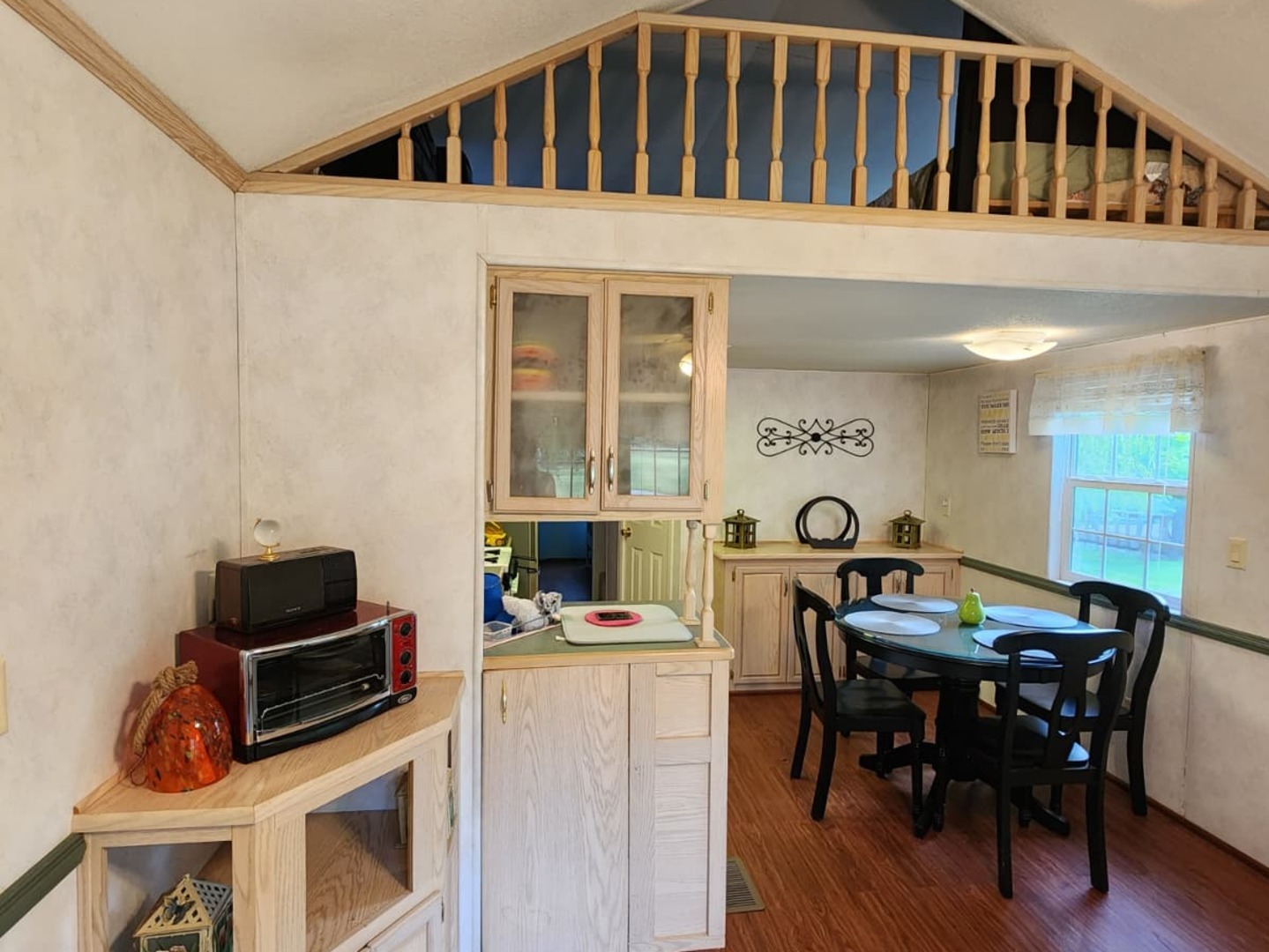 28-21 Woodhaven Sublette, IL 61367 - Photo 16 of 35 a view of a dining room with furniture and wooden floor