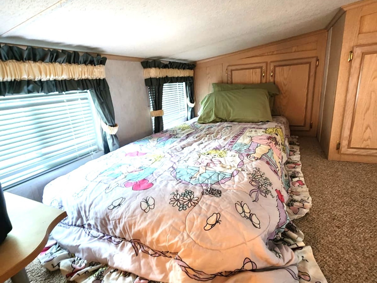 28-21 Woodhaven Sublette, IL 61367 - Photo 22 of 35 a bedroom with a bed and a window