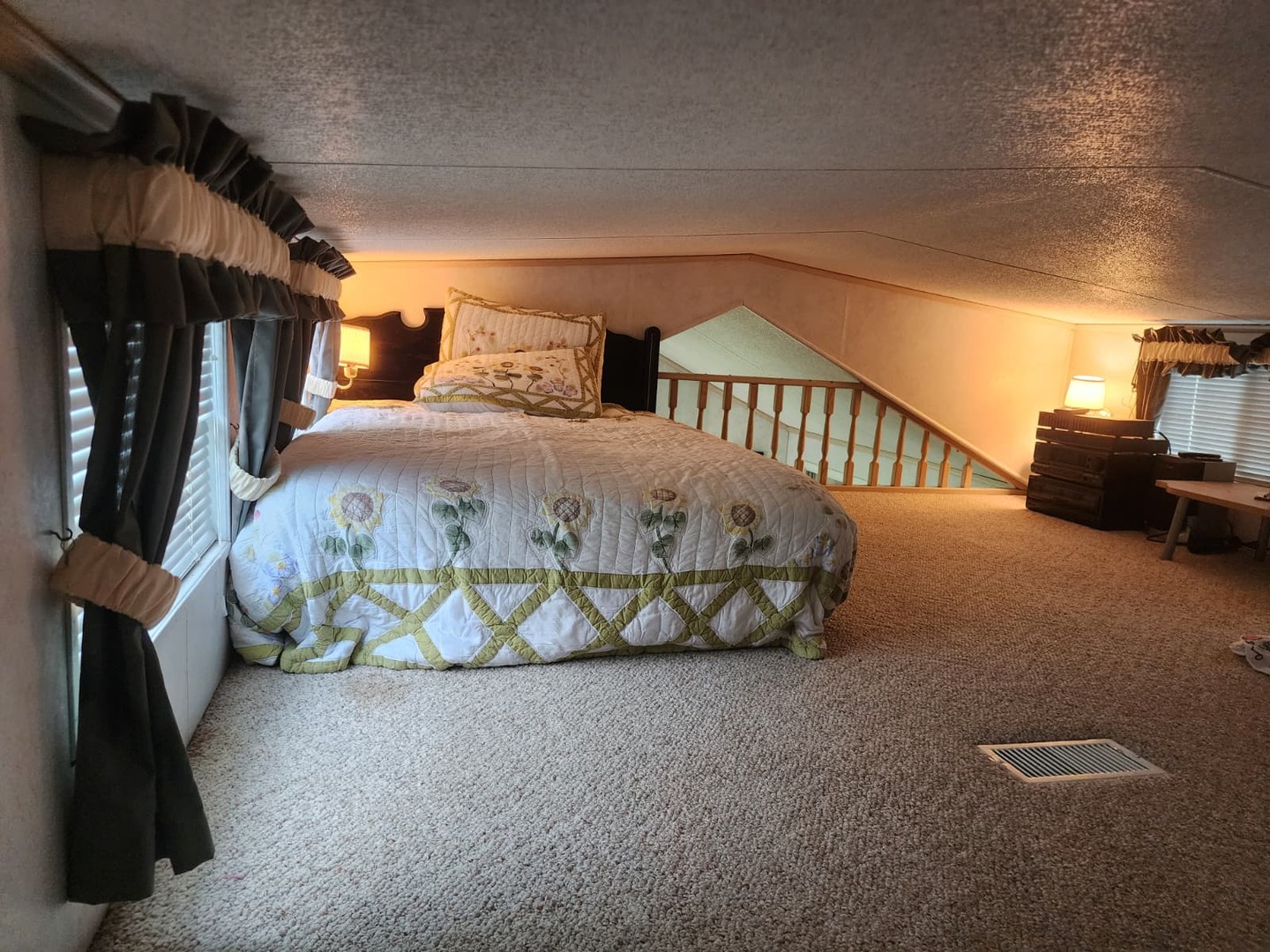 28-21 Woodhaven Sublette, IL 61367 - Photo 30 of 35 a bed sitting in a room next to a lamp