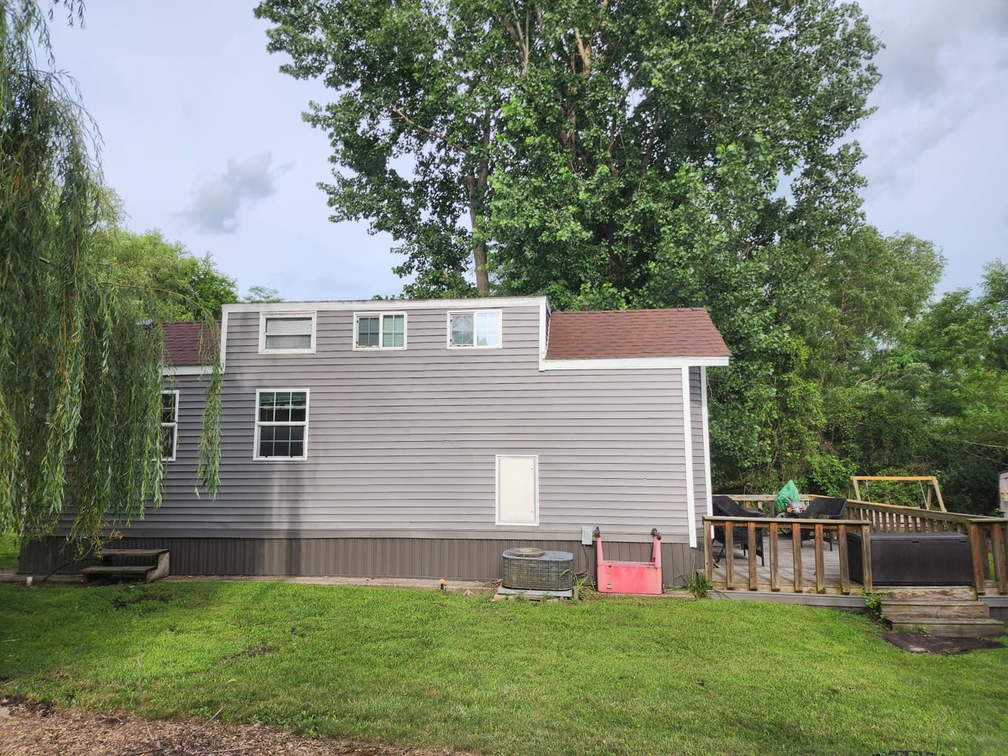 28-21 Woodhaven Sublette, IL 61367 - Photo 3 of 35 a house view with a sitting space and garden
