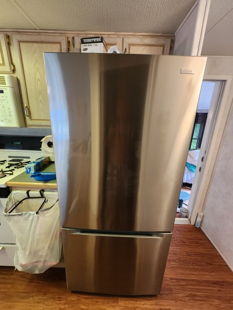 28-21 Woodhaven Sublette, IL 61367 - Photo 31 of 35 a view of walk in closet with wooden floor