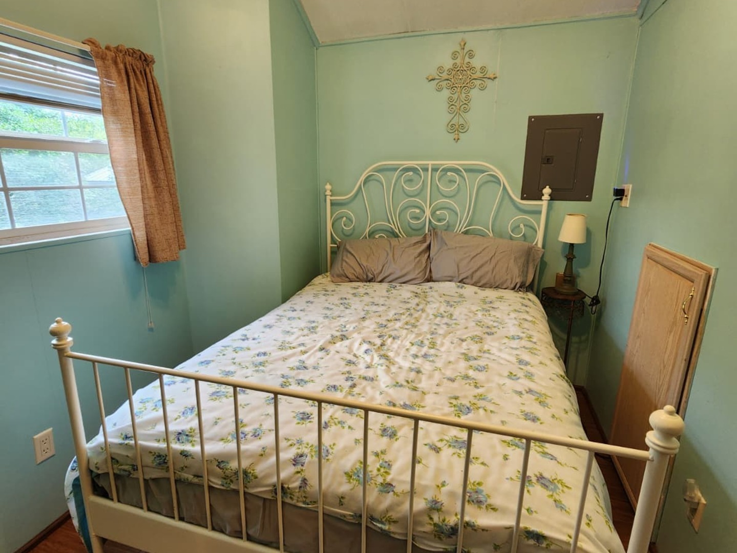 28-21 Woodhaven Sublette, IL 61367 - Photo 32 of 35 a bed sitting in a bedroom next to a window