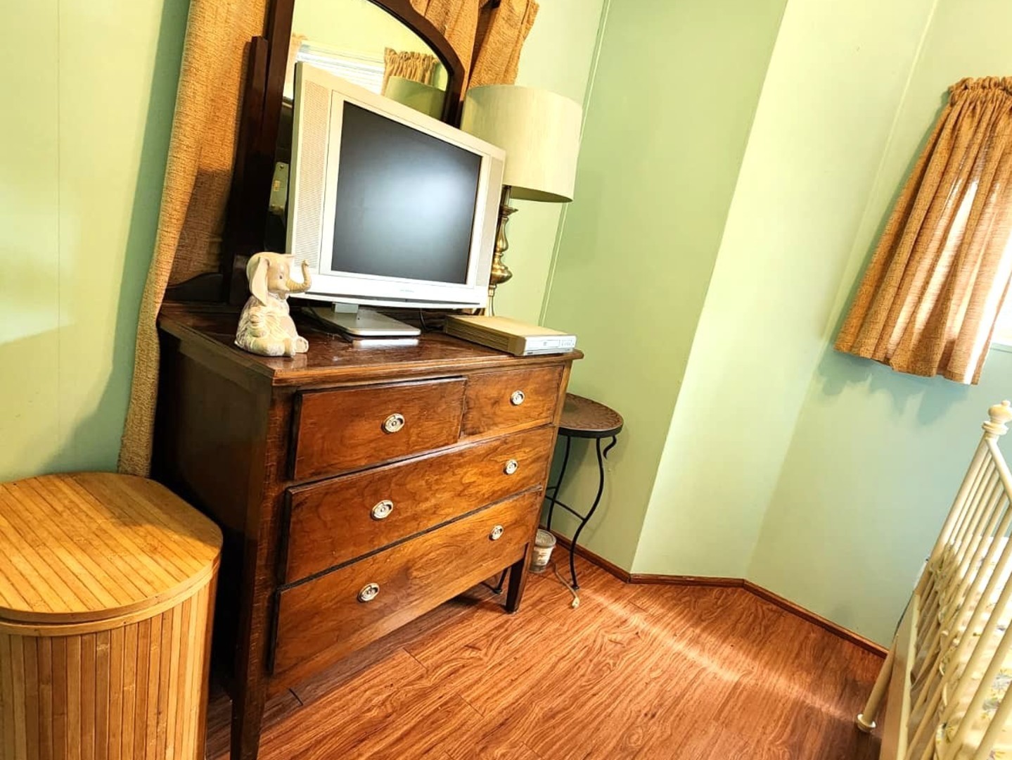 28-21 Woodhaven Sublette, IL 61367 - Photo 33 of 35 a living room with a bed furniture and a flat screen tv