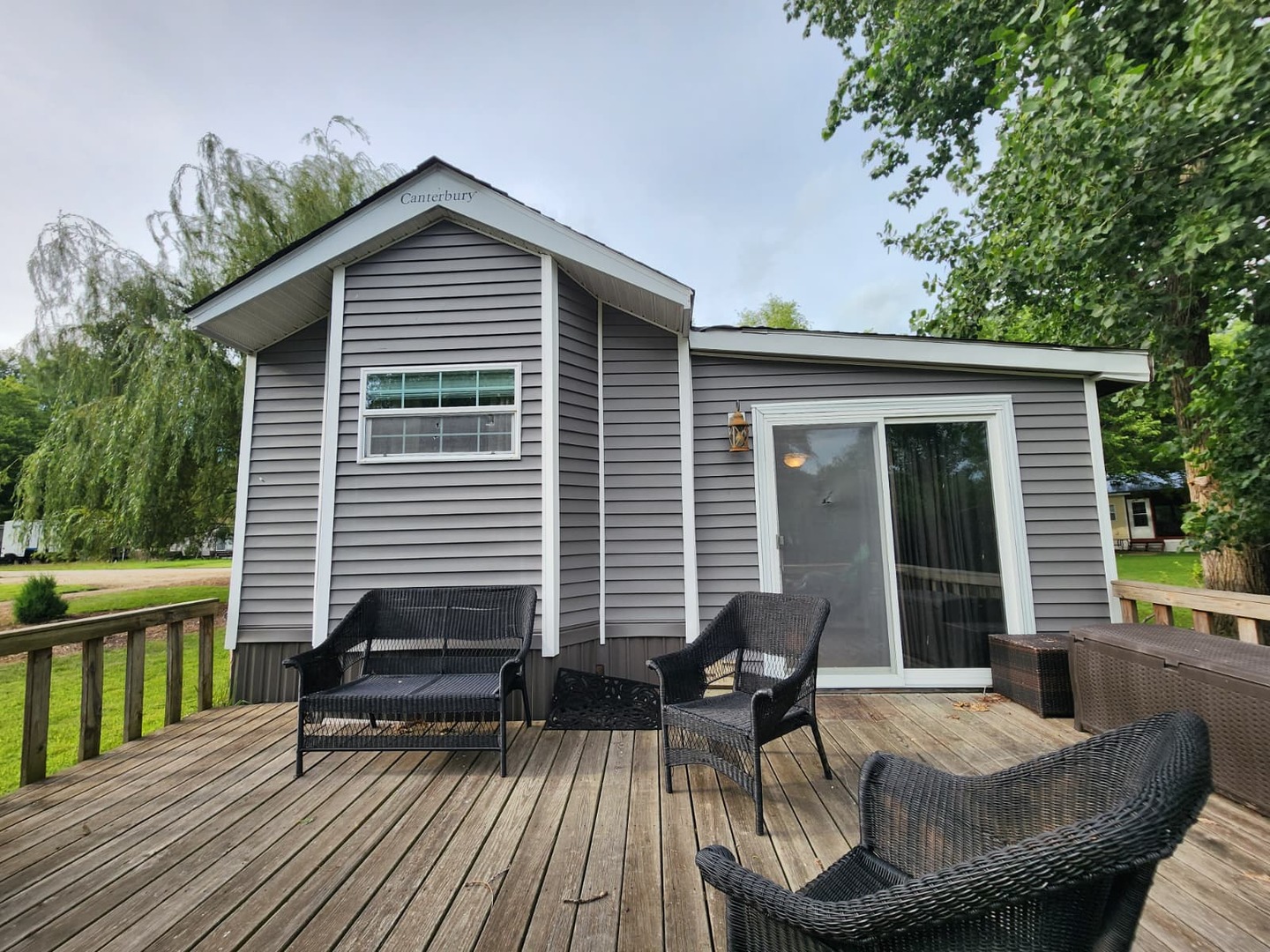 28-21 Woodhaven Sublette, IL 61367 - Photo 4 of 35 a view of outdoor sitting area with furniture and wooden floor