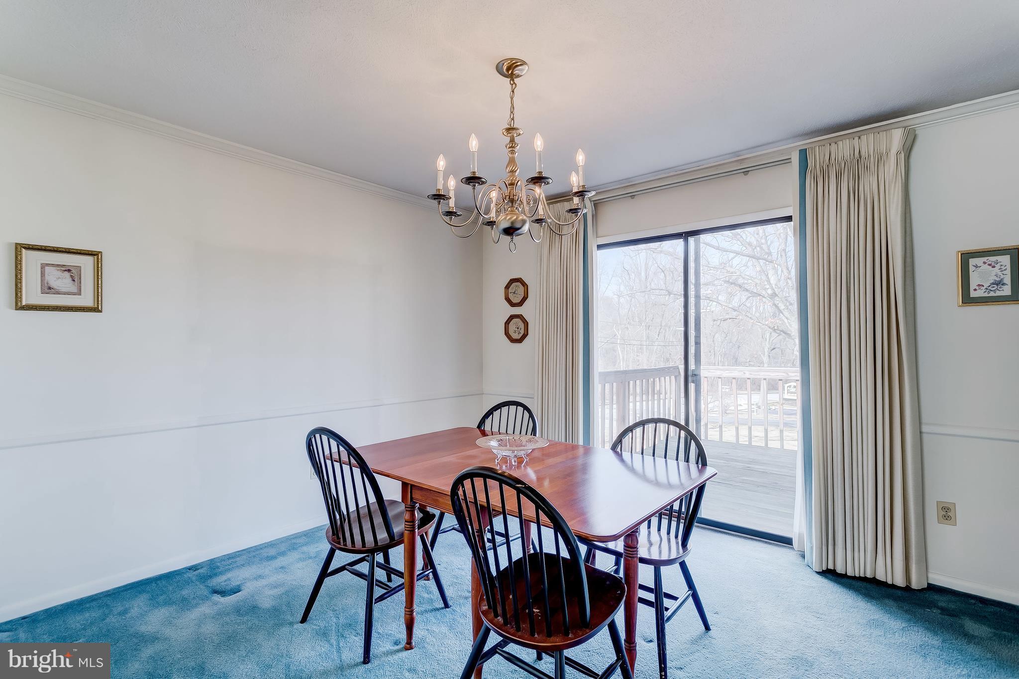 2400 Perring Woods Road Baltimore, MD 21234 - Photo 11 of 30 Dining Room with Sliders to Deck