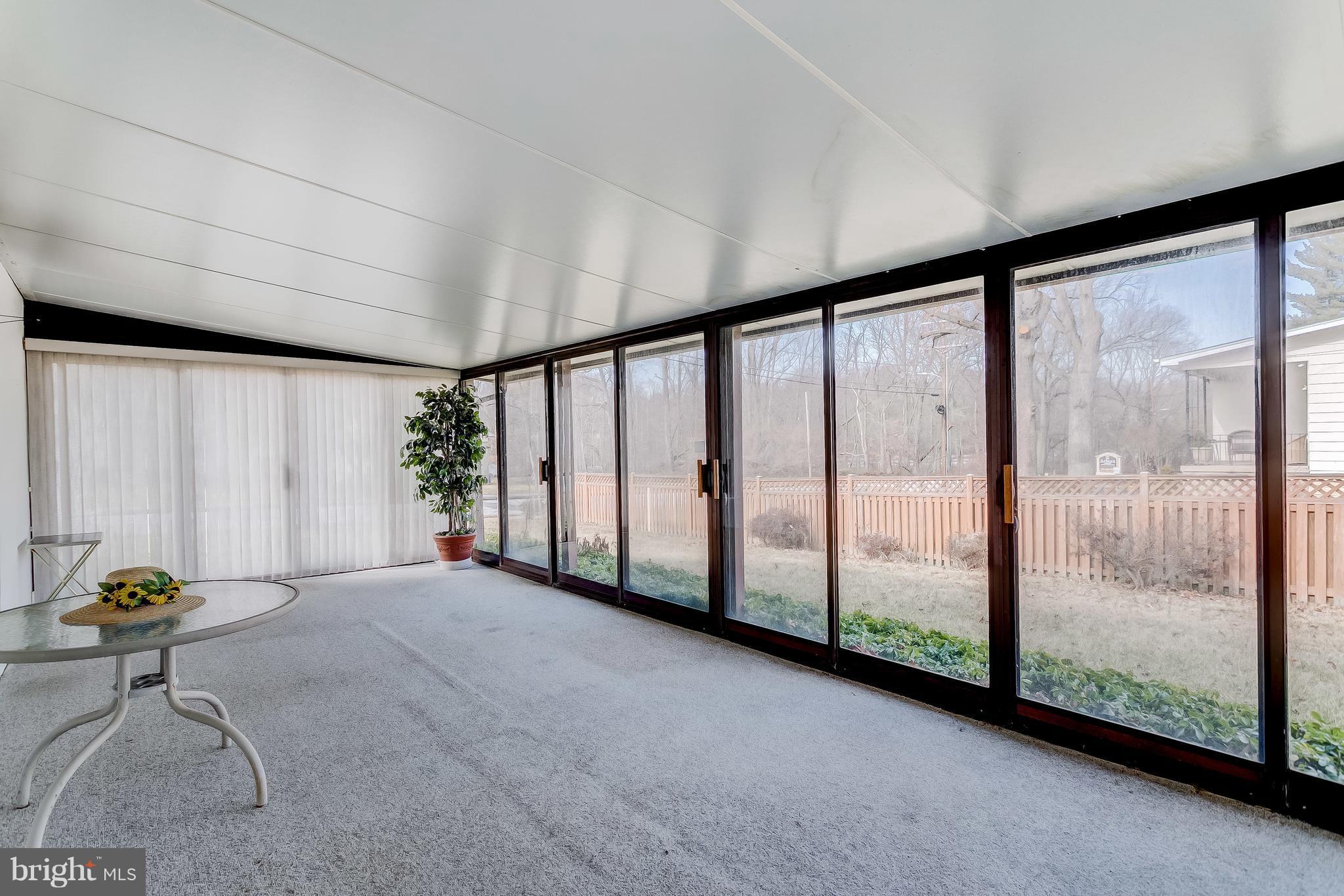 2400 Perring Woods Road Baltimore, MD 21234 - Photo 26 of 30 Huge Glass Sunroom off Lower Level Family Room