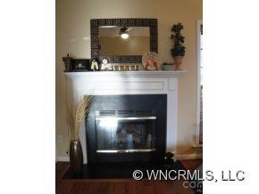 371 Planters Creek Road Fletcher, NC 28732 - Photo 10 of 24 a view of a living room with a fireplace