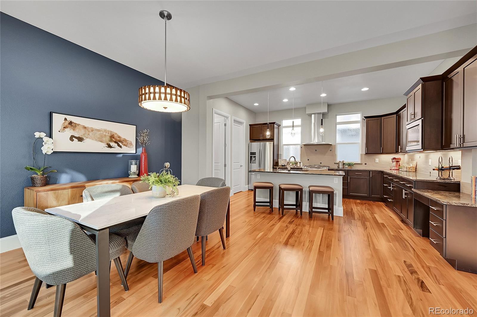3693 Silverton Street Boulder, CO 80301 - Photo 11 of 50 a view of kitchen with cabinets and wooden floor