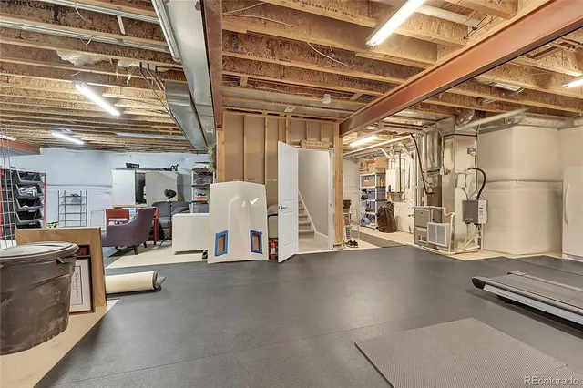 a view of a gym with wooden floor