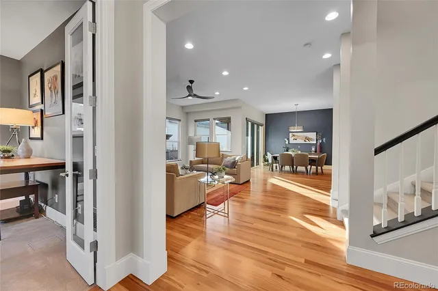 a view of a living room and kitchen view