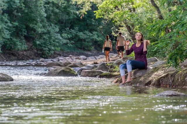 a view of a lake with mountain