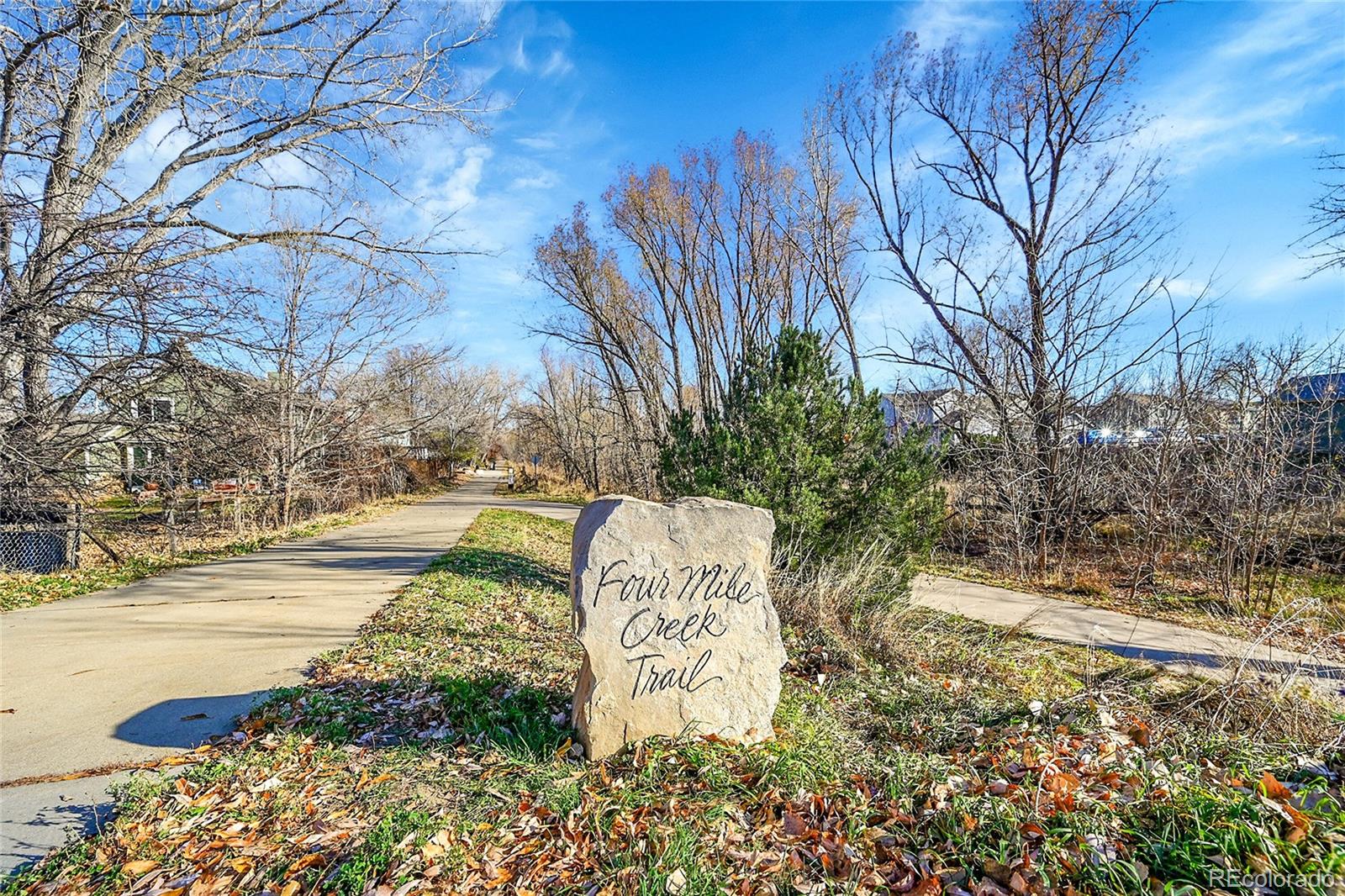 3693 Silverton Street Boulder, CO 80301 - Photo 45 of 50 a view of a yard with plants and large trees