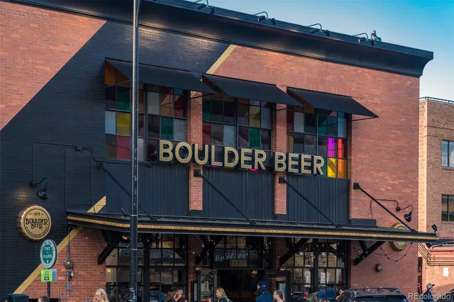 a view of a cafe with a table and chairs