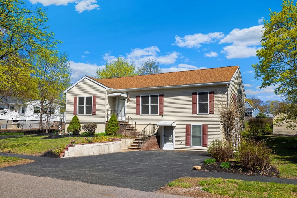 2 Earley Road Peabody, MA 01960 - Photo 2 of 30 a front view of a house with a yard