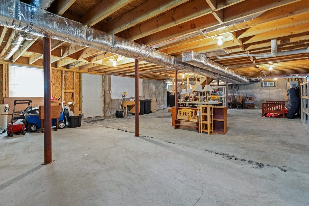 2 Earley Road Peabody, MA 01960 - Photo 23 of 30 a view of parking garage with cars