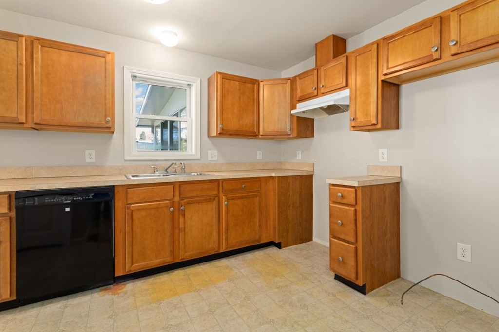 2 Earley Road Peabody, MA 01960 - Photo 9 of 30 a kitchen with stainless steel appliances granite countertop a sink and a cabinets
