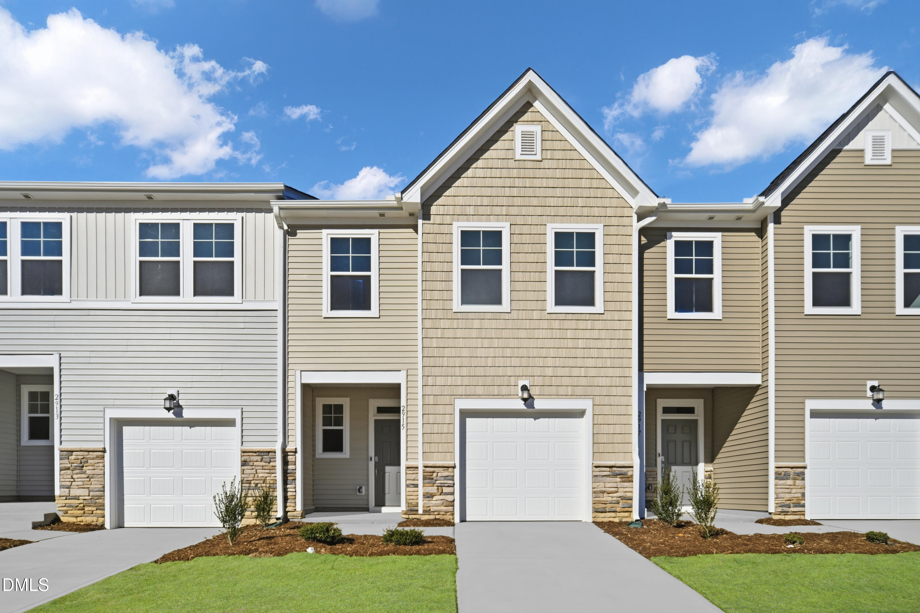 2915 Hickory Fld Drive Raleigh, NC 27616 - Photo 1 of 30 a front view of a house with a yard and garage